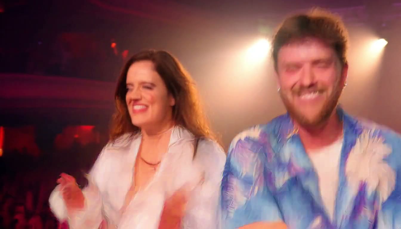 MiniMax H3 AI video example showing a couple enjoying a lively concert with vibrant lighting and energetic music